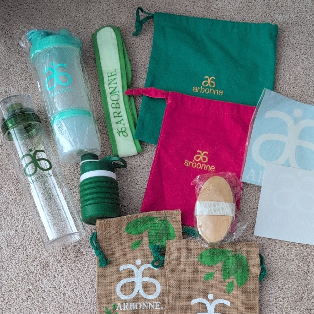 Arbonne Wellness Collection with Green and Pink Highlights
